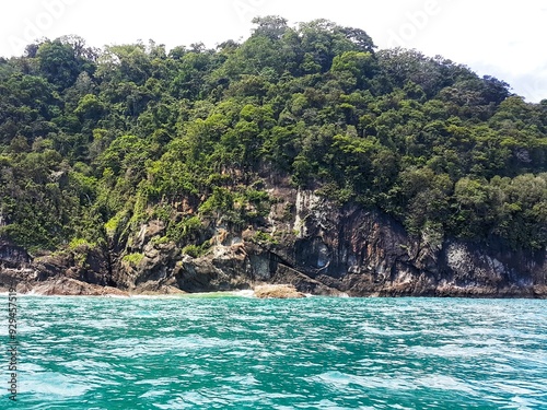 Rocky hill on the edge of the sea photo