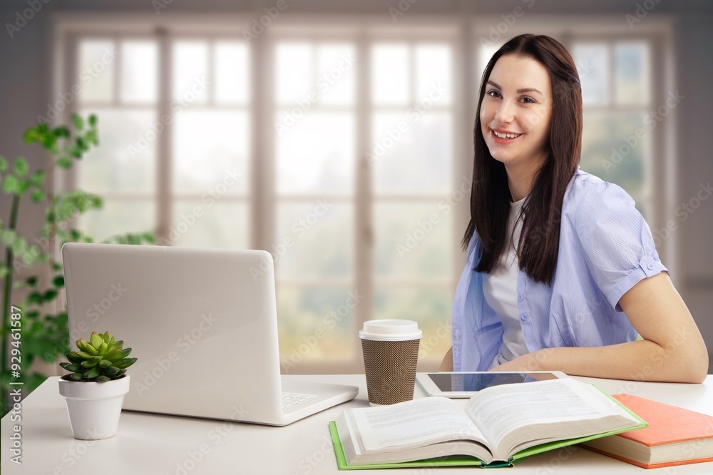 © BillionPhotos.com - Happy student study sitting at home © BillionPhotos.com - Happy student study sitting at home