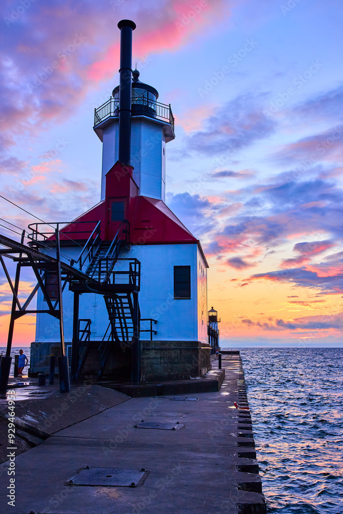 Red and White Lighthouse at Sunset on Lake Michigan Pier - Eye-Level Perspective Red and White Lighthouse at Sunset on Lake Michigan Pier - Eye-Level Perspective