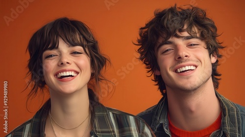 Young couple smiling and looking at the camera