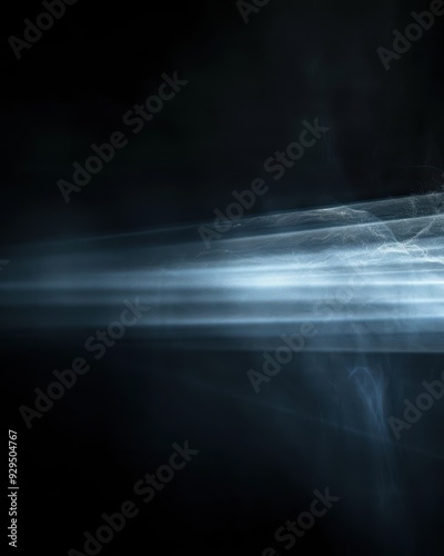 Abstract Light Streaks and Smoke on a Dark Background photo
