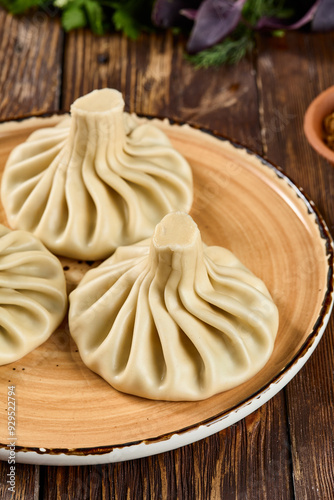 Authentic Georgian Khinkali on a Rustic Plate - Traditional Dumplings