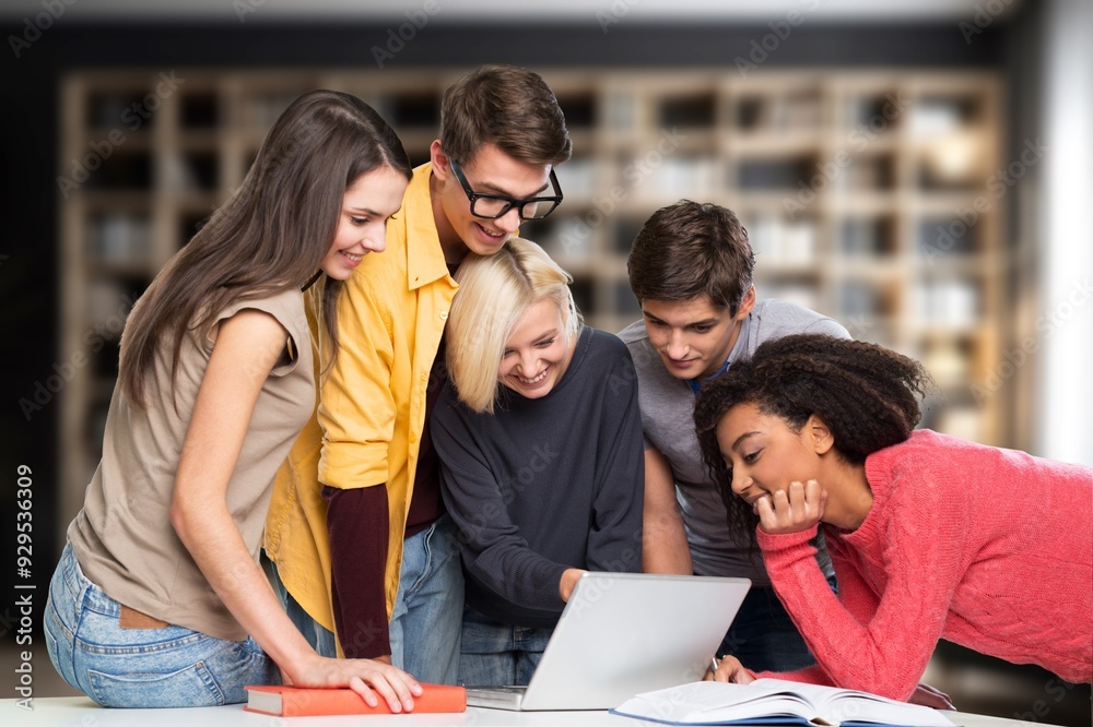 Happy students friends learning in library for education Happy students friends learning in library for education
