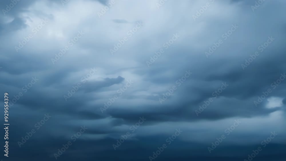 Dark storm clouds are gathering in the sky, creating an ominous atmosphere of impending rain or a powerful thunderstorm Dark storm clouds are gathering in the sky, creating an ominous atmosphere of impending rain or a powerful thunderstorm