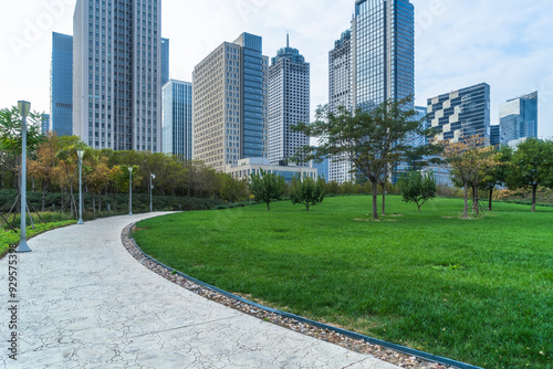 beautiful green field near modern office building
