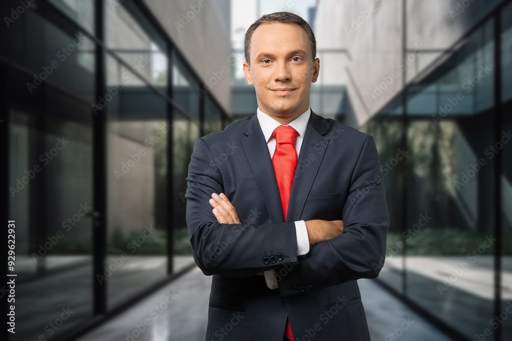 Proud portrait of businessman near office. Proud portrait of businessman near office.