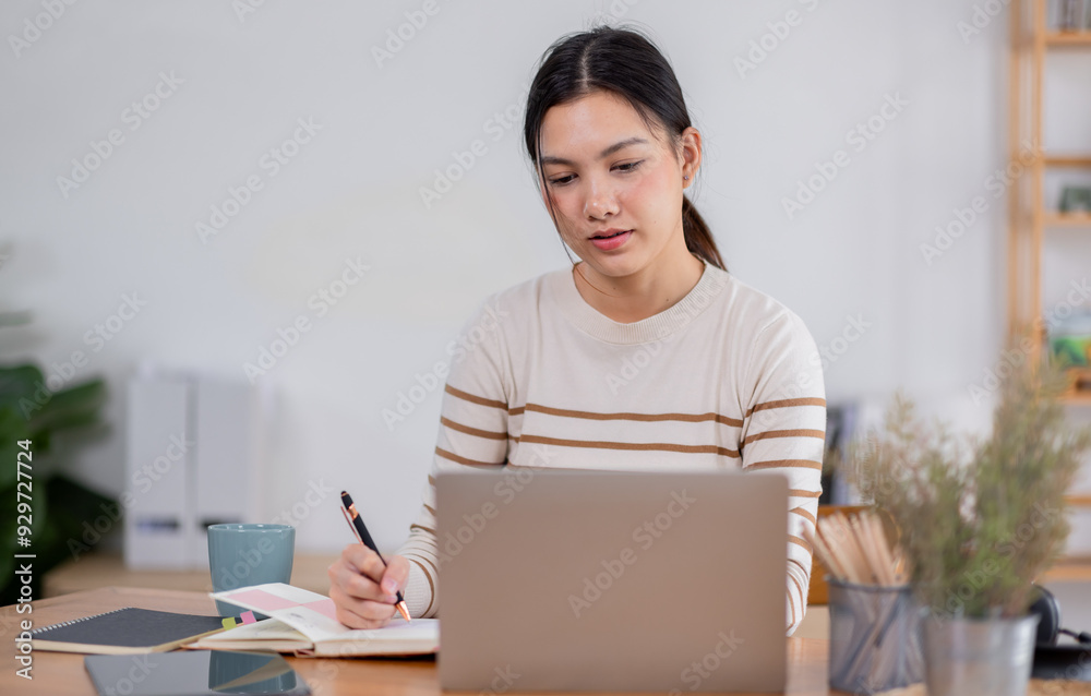 Beautiful young freelancer asian woman working indoors,  Entrepreneur and freelancer people concept.
