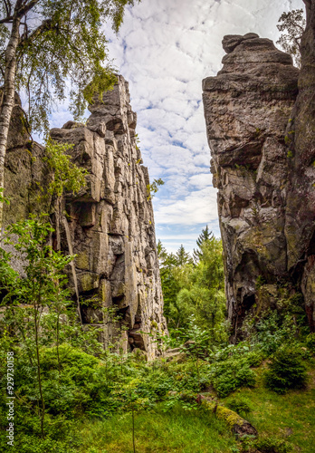 Passageway cuts through two towering rocky cliffs
