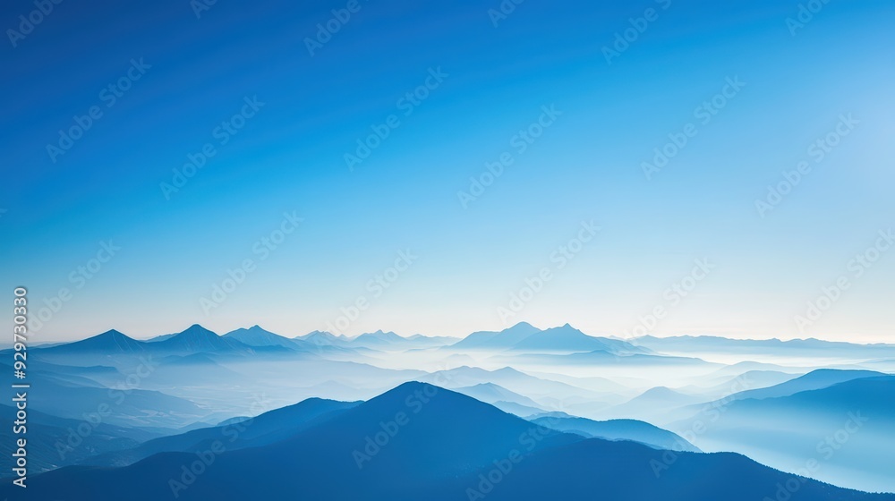 Blue Mountains and Sky Wallpaper. A serene landscape wallpaper with a distant mountain range bathed in blue hues under a clear sky. Blue Mountains and Sky Wallpaper. A serene landscape wallpaper with a distant mountain range bathed in blue hues under a clear sky.