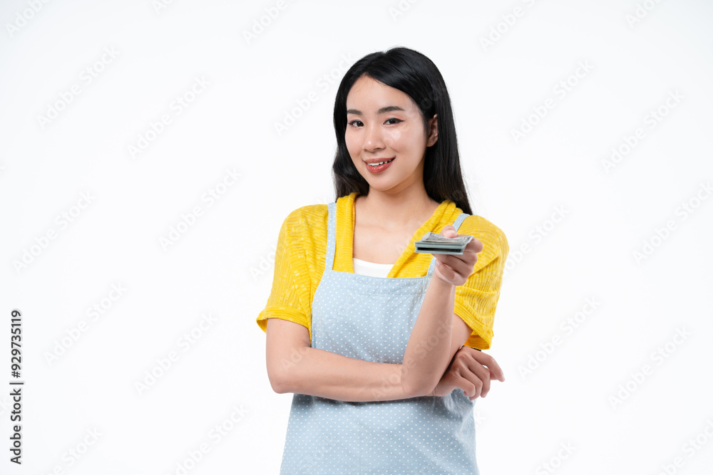 Young chef asian woman wear apron hold cash money banknotes isolated on white background. Cook food concept. Young chef asian woman wear apron hold cash money banknotes isolated on white background. Cook food concept.