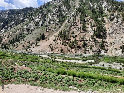 Majestic natural beauty of Gilgit-Baltistan in Pakistan. Gilgit-Baltistan is known for its astonishing natural beauty. Unique landscapes, evergreen  forests, cold deserts and snow covered mountains.  photo