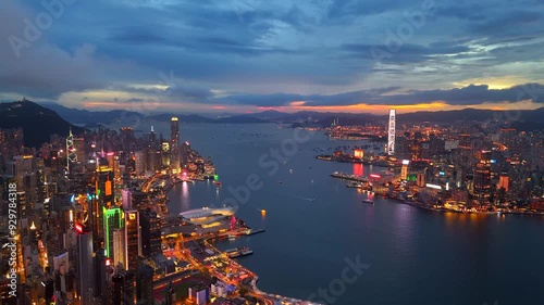 Wallpaper Mural Aerial view drone video City landscape of the famous travel landmark cityscape. buildings with light and transportation at Victoria Harbour skyline and Kowloon at sunset along Hong Kong Island China. Torontodigital.ca