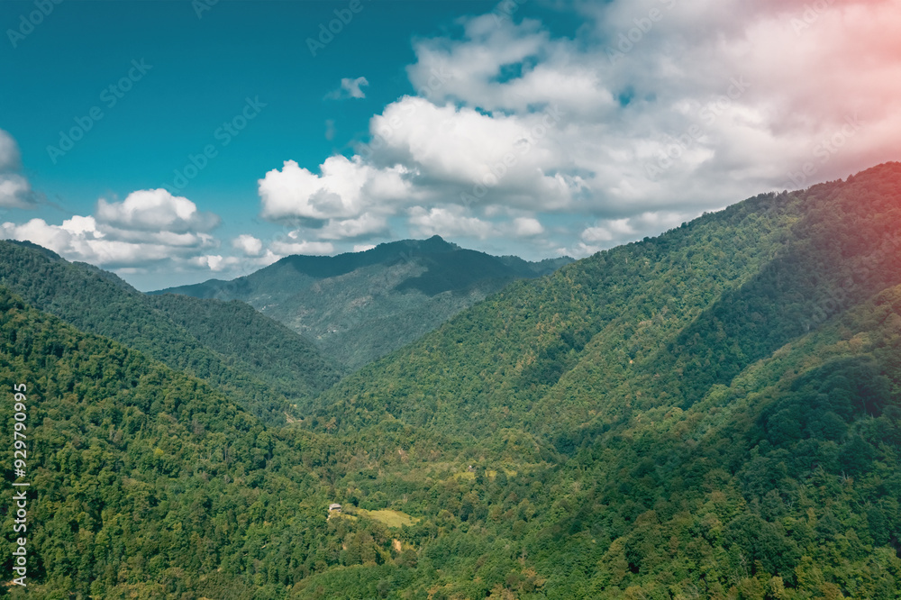 A stunning mountain landscape with green valleys and a blue sky, truly breathtaking and inspiring A stunning mountain landscape with green valleys and a blue sky, truly breathtaking and inspiring