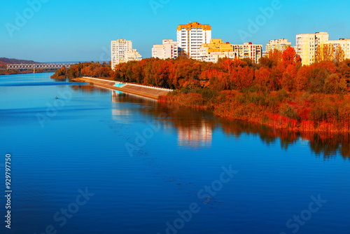 City with a river running through it and a bridge in autumn. Rybnitsa is a town in the breakaway Moldovan region of Transnistria