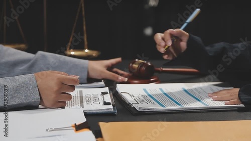 Consultation and conference of lawyers and professional businessman working and discussion having at law firm in office. Concepts of law, Judge gavel with scales of justice.