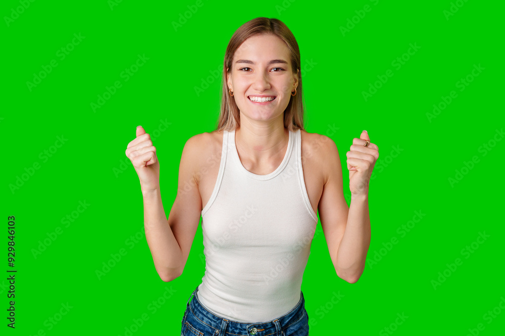 Smiling Woman With Fists Pumped In Front Of Green Screen Smiling Woman With Fists Pumped In Front Of Green Screen