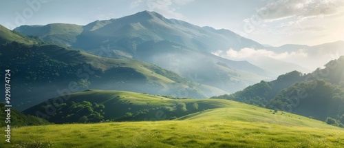  A lush green hillside, draped in grass, faces a distant mountain range under cloud-speckled skies