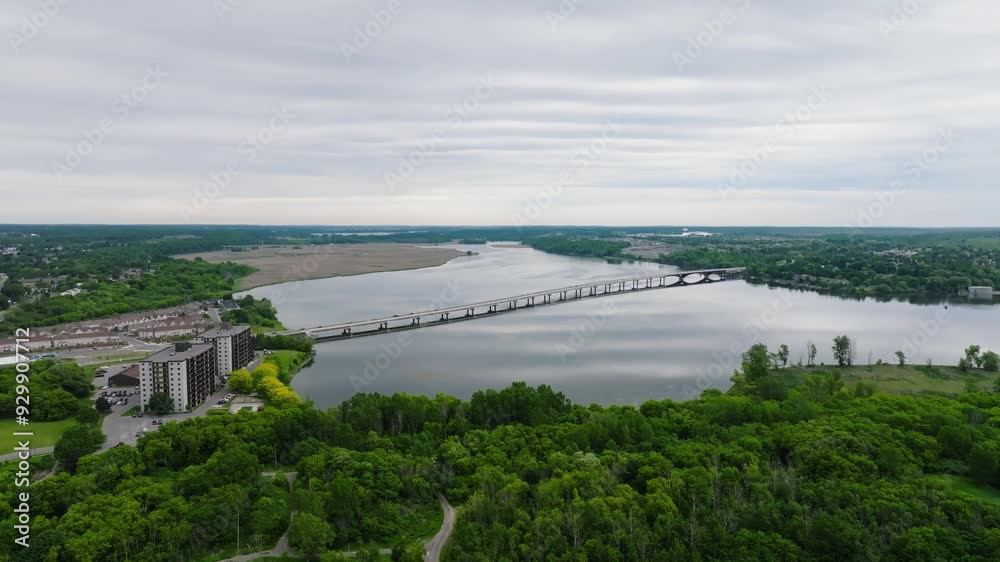 Aerial view of Waaban Crossing bridge over Great Cataraqui River in Kingston Ontario Canada Limestone City in summer waterfront cityscape Aerial view of Waaban Crossing bridge over Great Cataraqui River in Kingston Ontario Canada Limestone City in summer waterfront cityscape