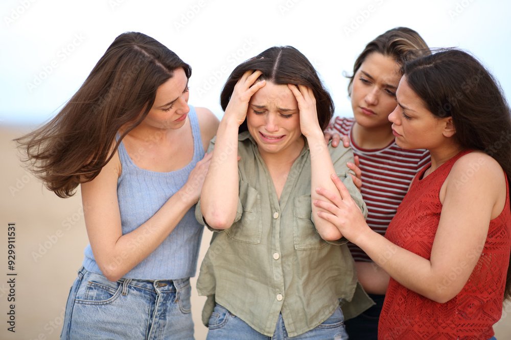 Desperate woman complaining and friends comforting her Desperate woman complaining and friends comforting her