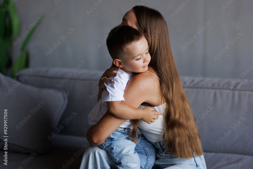 Mom and son. Mother hugging her child. An adorable little boy hug his ...