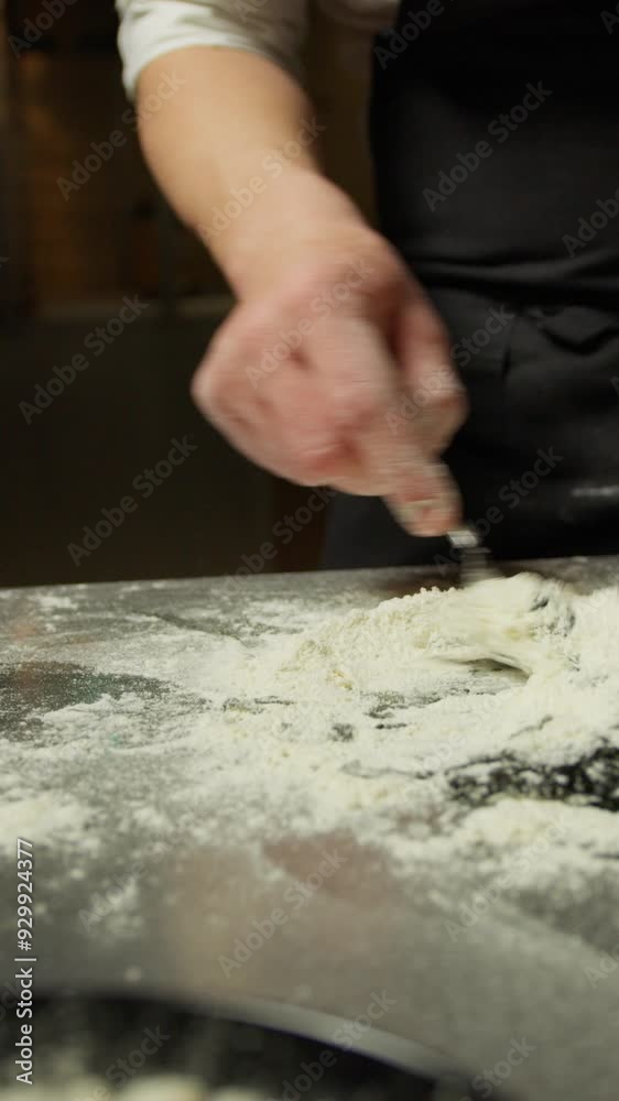Chef Mixes The Dough With Flour Eggs And Cuttlefish Ink Food Into Restaurant Chef Mixes The Dough With Flour Eggs And Cuttlefish Ink Food Into Restaurant