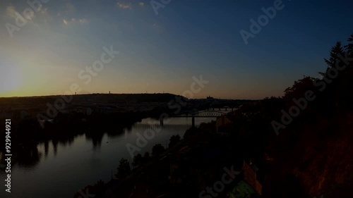 Prague day-night time lapse video in 4K river view in Czech Republic, Europe