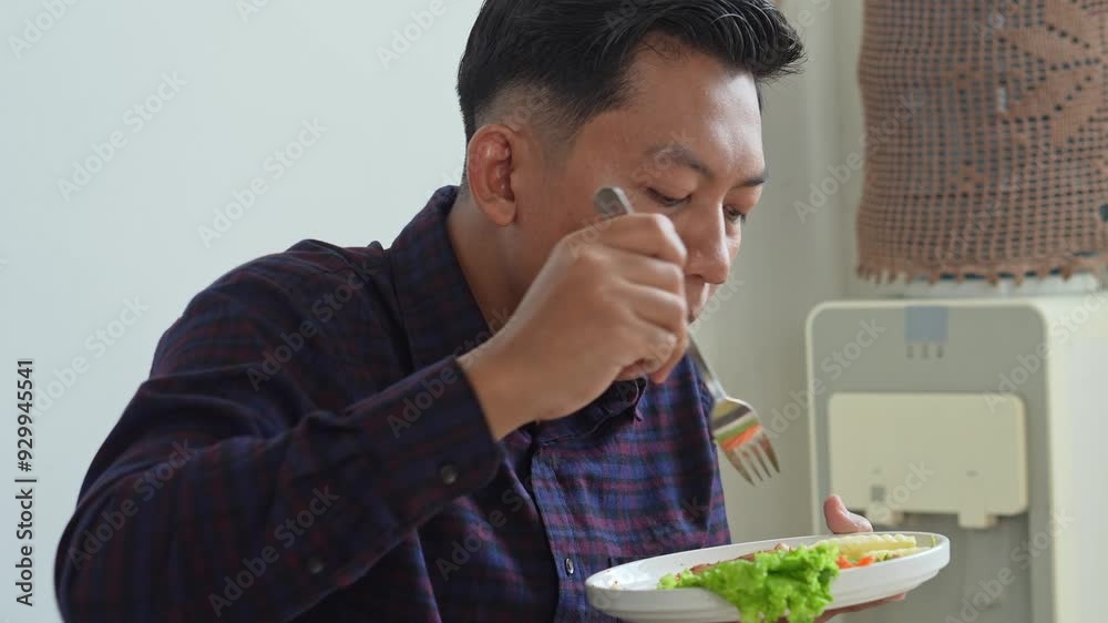 Happy Asian Young Man Enjoying Delicious Chicken Steak At Home Happy Asian Young Man Enjoying Delicious Chicken Steak At Home
