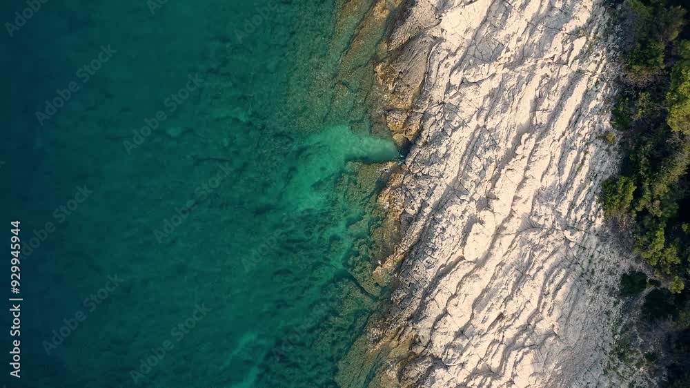 High-altitude vertical aerial shot of Croatia's coastal region during summer, Mali Losinj Island