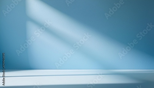 Wallpaper Mural Empty room minimalistic light blue background for product presentation with shadow and light from windows Torontodigital.ca