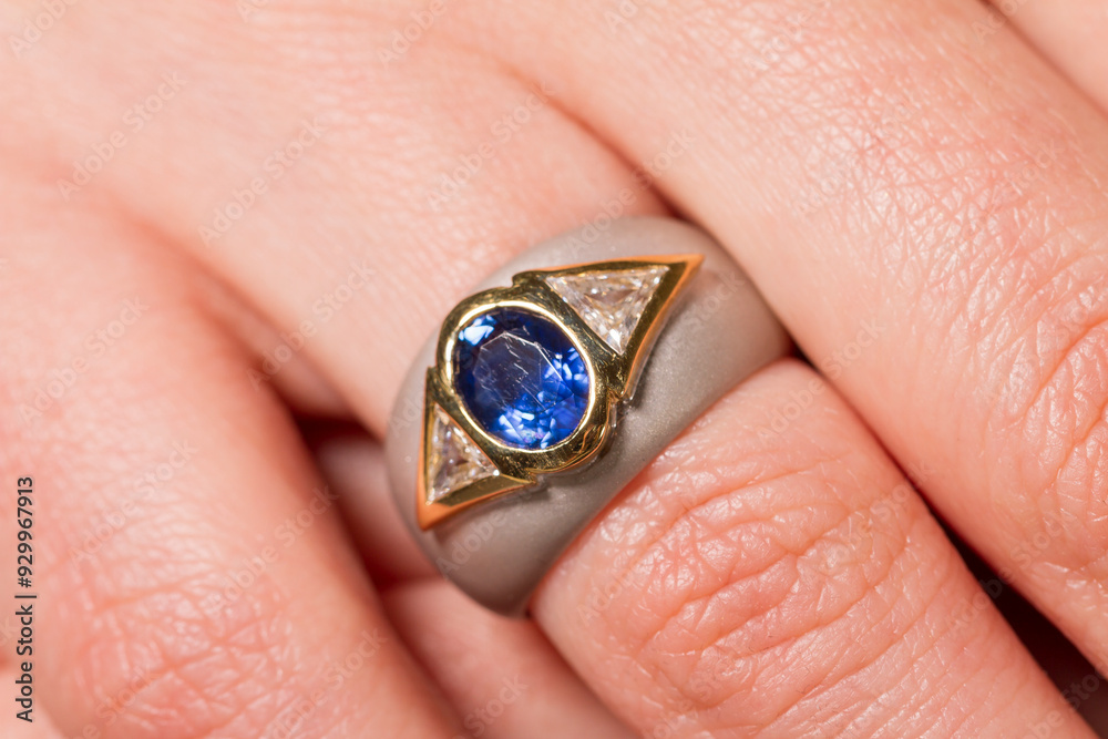 Macro shot of a jewel ring on a female hand. Macro shot of a jewel ring on a female hand.