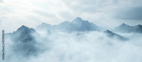 Mountain Peaks Emerging from Mist