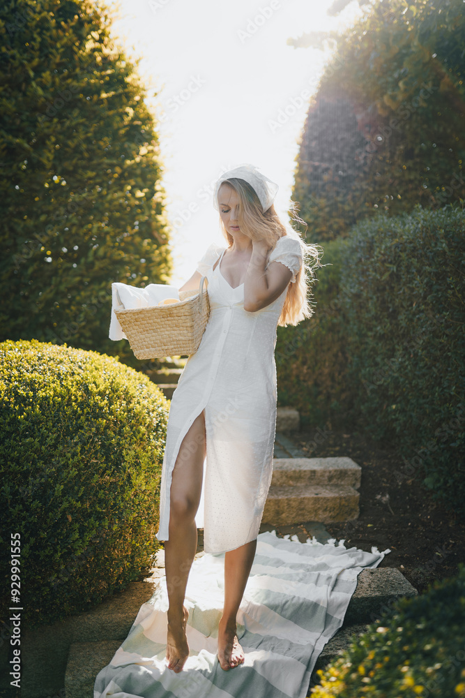 photo in Italian style with a sexy young woman in a light summer dress a peasant woman picking fruits