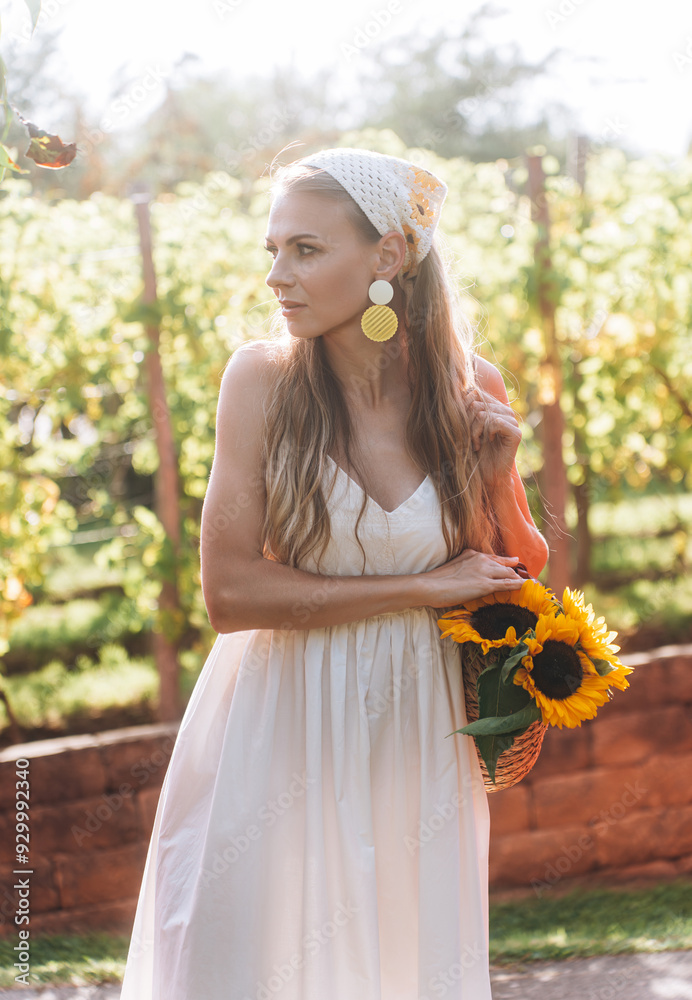 photo in Italian style with a sexy young woman in a light summer dress a peasant woman picking fruits