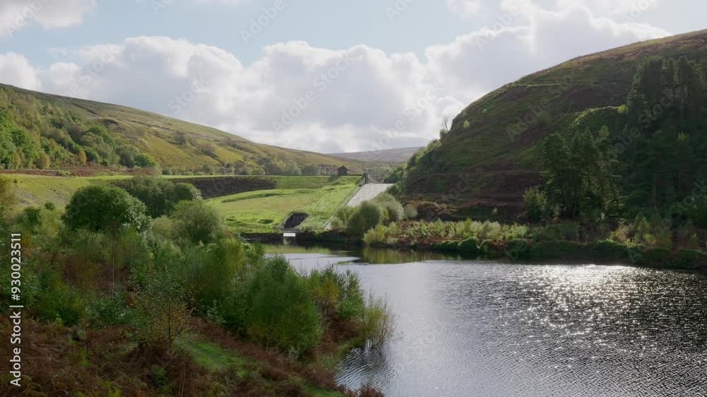 Beautiful English country landscape showing heather covered hills, blue lakes and clear skies. Aerial cinematic video footage Beautiful English country landscape showing heather covered hills, blue lakes and clear skies. Aerial cinematic video footage