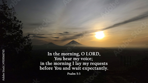 Bible verse quote - In the morning, O LORD, You hear my voice. In the morning i lay my requests before you and wait expectantly. Psalm 5:3 On mountain nature landscape background with sun rise view. photo