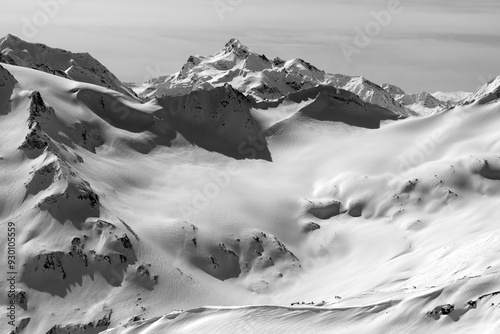 Black and white view on snowy peaks photo