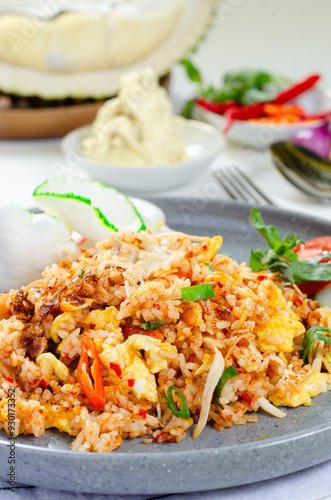 Fresh prepared indonesian durian nasi goreng served in local restaurant on Depok. Traditional asian cuisine made of fresh ingredients
