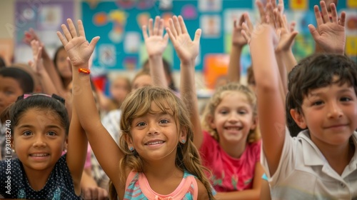 A group of enthusiastic school kids raise their hands during a lively lesson, showcasing their eagerness to participate