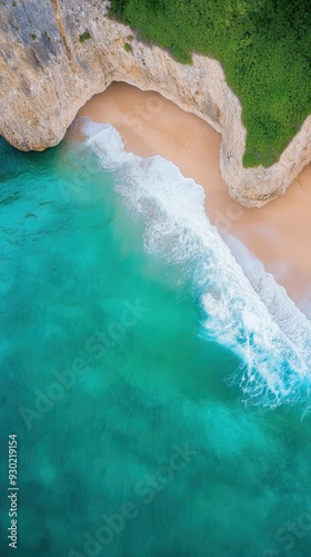 Aerial of a hidden beach surrounded by cliffs, with waves crashing against the rocks and seagulls flying overhead, capturing the untouched beauty of nature