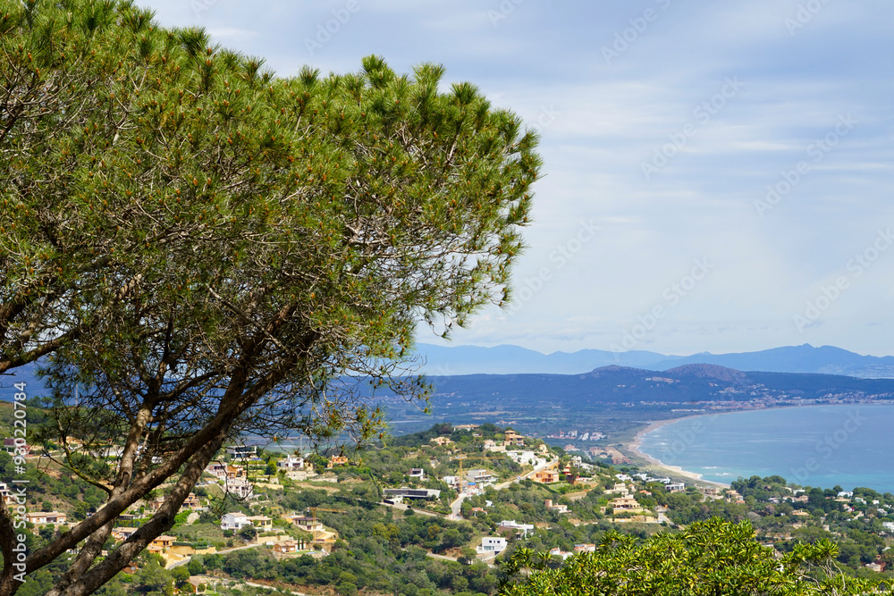 view from the Castell de Begur towards the Mediterranean Sea and the long beach between Pals and L'Estarit, Pyrenees at the horizon, Catalonia, Costa Brava, Girona, Spain view from the Castell de Begur towards the Mediterranean Sea and the long beach between Pals and L'Estarit, Pyrenees at the horizon, Catalonia, Costa Brava, Girona, Spain