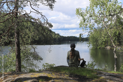 Photography Woman enjoying the view by the lake