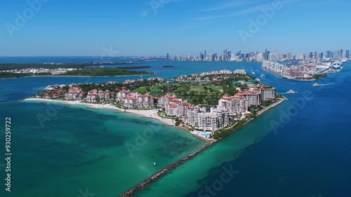 Wallpaper Mural Stunning view of South Point coastal area with buildings and clear demarcation between land and sea. Vibrant blue water and contrast between urban skyline Torontodigital.ca