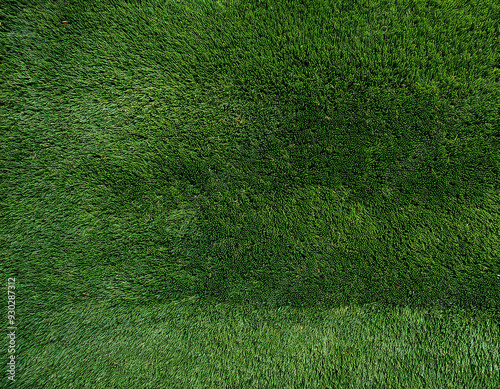 Artificial Green grass texture seamless background, top view photo