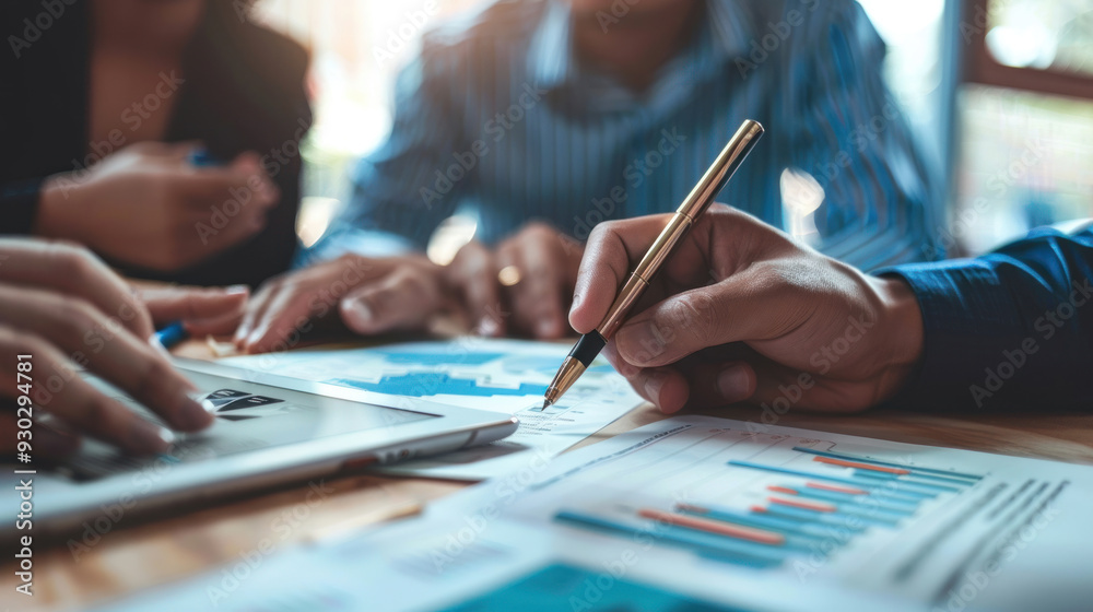 Financial advisor discussing a chart with a couple, highlighting financial planning and investment strategies Financial advisor discussing a chart with a couple, highlighting financial planning and investment strategies