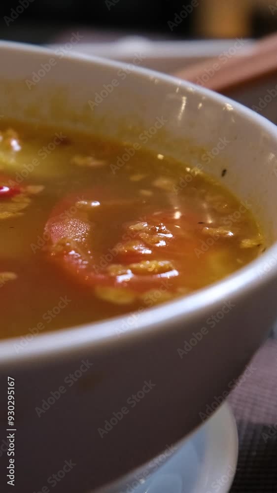 Finnish fish soup with red fish with spices and fresh dill on a dark stone background. Top view with copy space.. Fish soup with red fish Finnish fish soup with red fish with spices and fresh dill on a dark stone background. Top view with copy space.. Fish soup with red fish