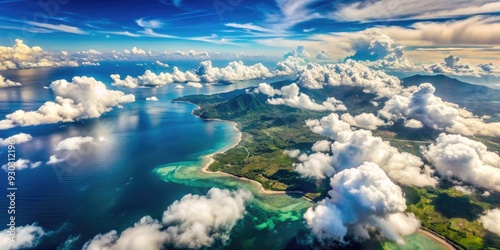 Aerial perspective of fluffy white clouds and serene waters of Gunung Kidul, Yogyakarta, Indonesia, seen from an airplane window on a sunny day. photo