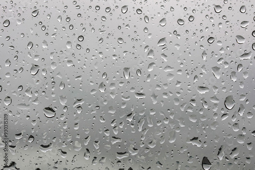 Wallpaper Mural Abstract background photo of Raindrops Or Vapor Trough Window Glass. Macro shot rain drops texture on dark gray glass background. Torontodigital.ca