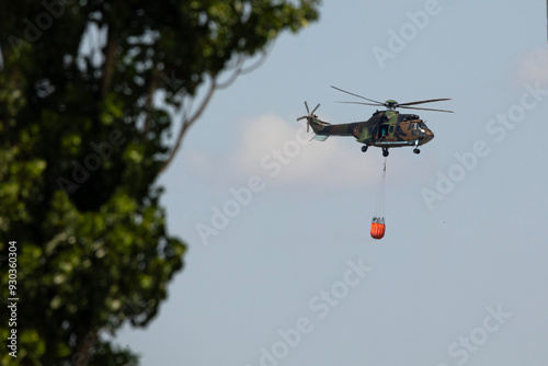 Firefighting helicopter in action photo