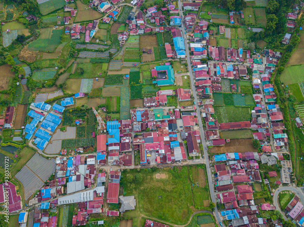 Fototapeta premium Aerial drone view of greenery countryside scenery in Berastagi, North Sumatra, Indonesia. 