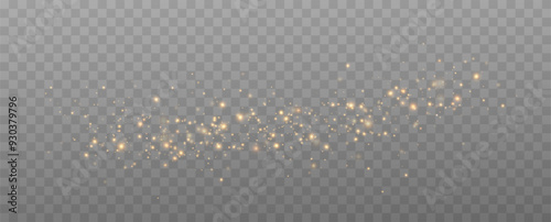 Golden sequins glow with many lights. Glittering dust. Luxurious background of golden particles.